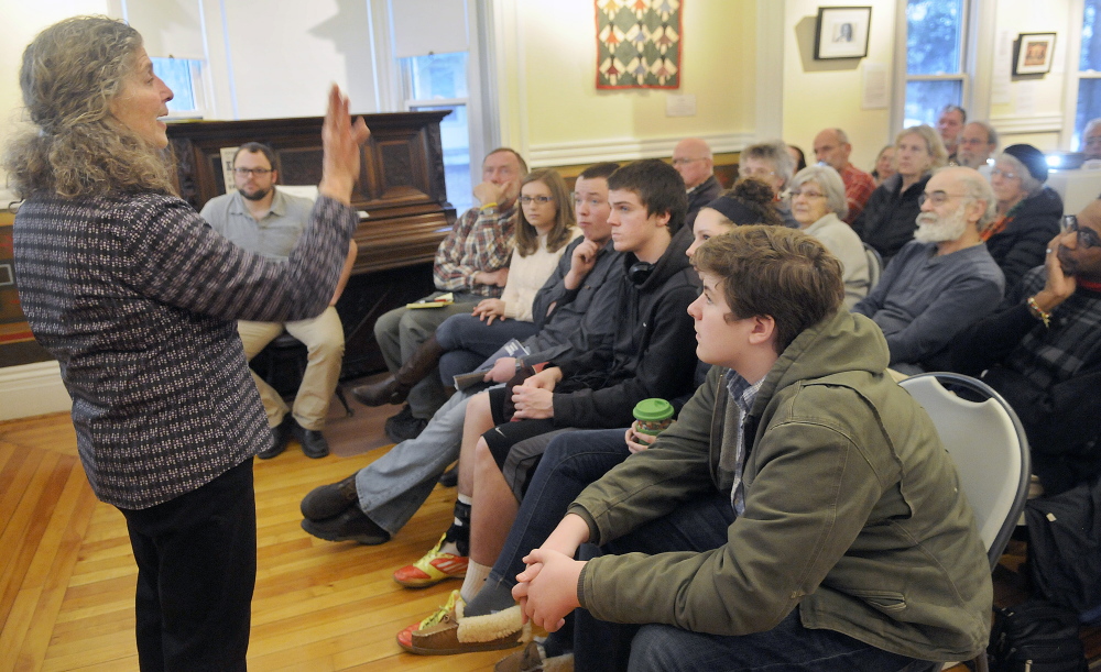 Candace Kanes, curator of the Maine Historical Society’s Memory Network, discusses the hundreds of former slaves who came to Maine in the last years of the Civil War on Monday during a Martin Luther King Day talk at the Southard House Museum in Richmond.