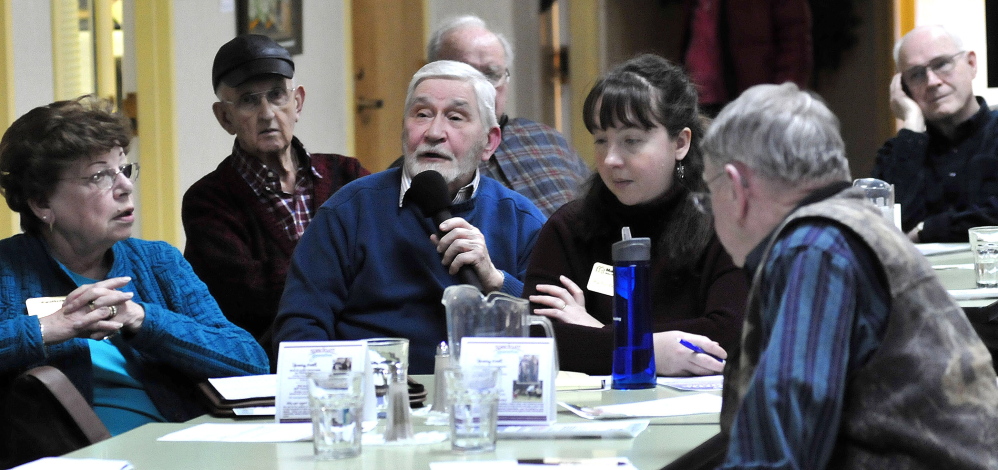 George Fowler asks questions Tuesday at the Muskie Center in Waterville.