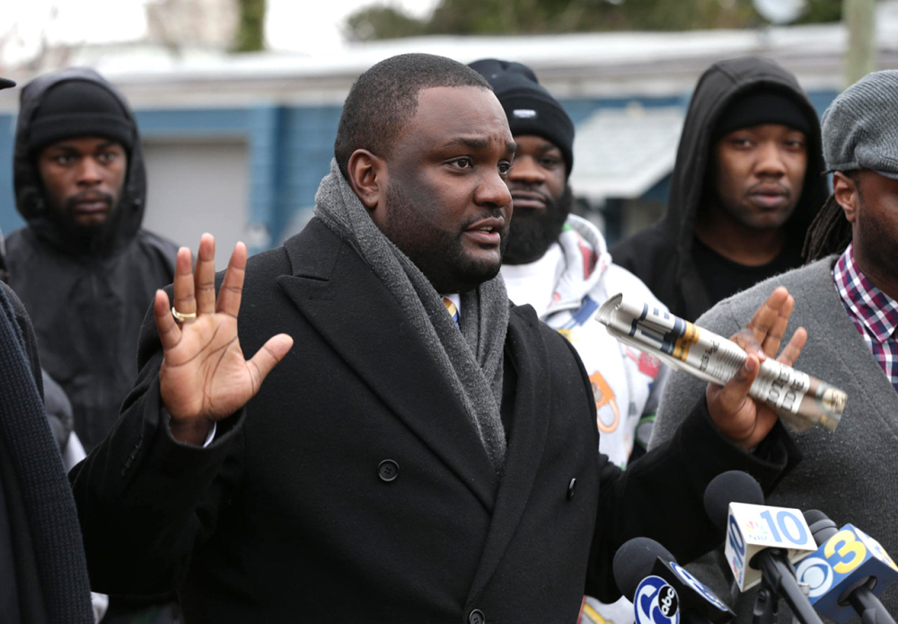 Walter Hudson, chairman of the National Awareness Alliance civil rights group, speaks at a press conference Wednesday in Bridgeton, N.J. He said, “The video speaks for itself that at no point was Jerame Reid a threat and he possessed no weapon on his person. ... He complied with the officer and the officer shot him.”