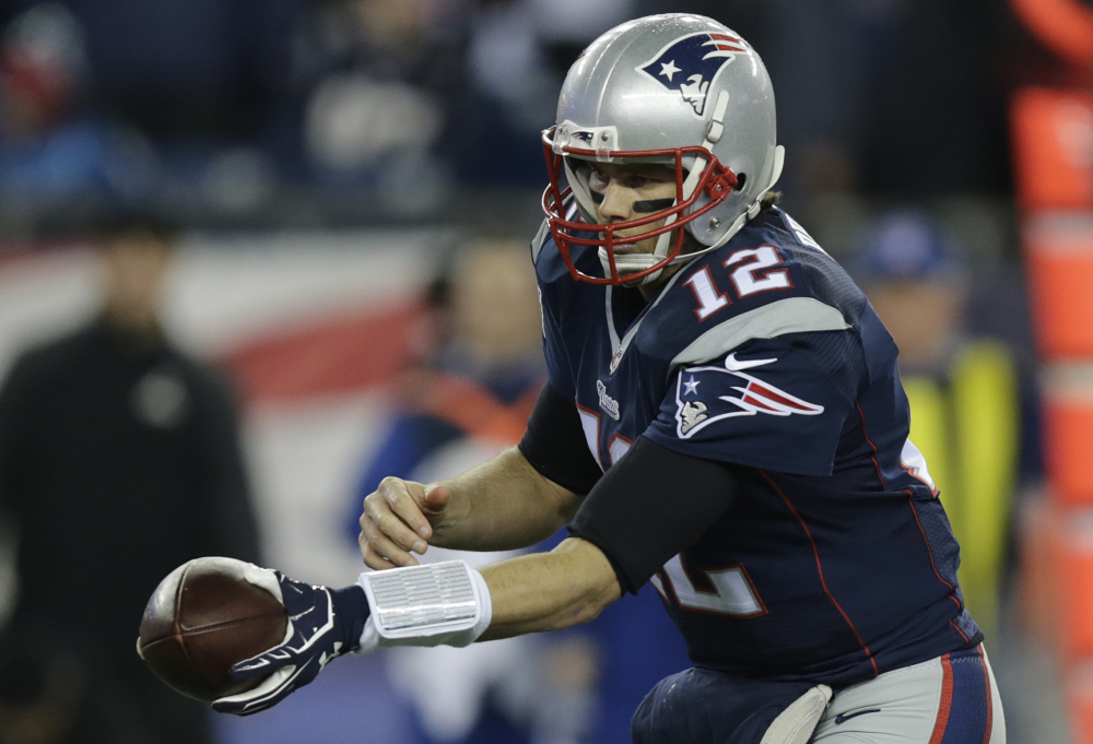 The NFL says its investigation into whether the New England Patriots used underinflated footballs in the AFC championship game is ongoing after a report Tuesday night. The report claims the league found 11 balls were not properly inflated.