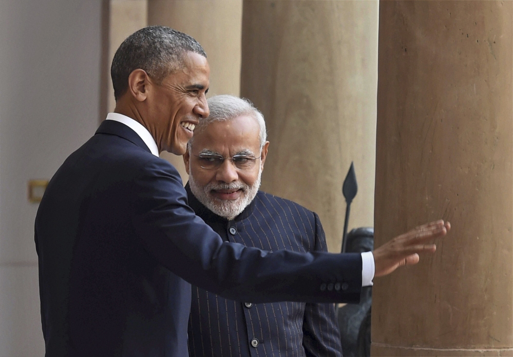 U.S. President Barack Obama, left and Indian Prime Minister Narendra Modi pose for the media before they held their talks, in New Delhi, India, on Sunday. Seizing on their personal bond, Obama and Modi said Sunday they had made progress on nuclear cooperation and climate change, with Obama declaring a “breakthrough understanding” in efforts to free U.S. investment in nuclear energy development in India.