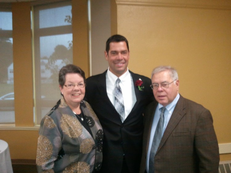 Daren Meader with his parents, Betty-Jane and Richard Meader.