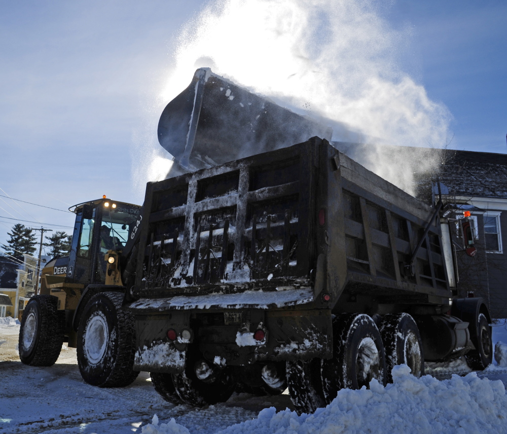 With more snow on the way, Monmouth Public Works crews spent Thursday clearing snow from Tuesday’s storm.