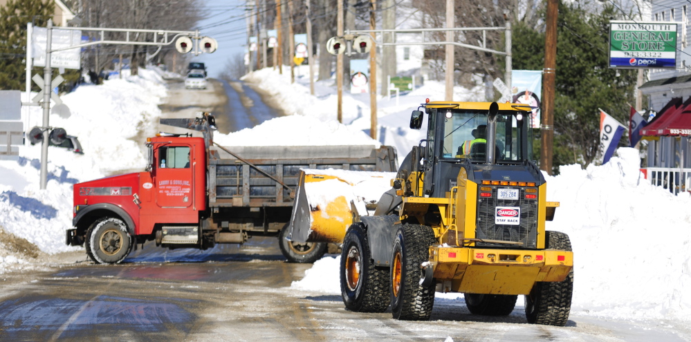 Monmouth Public Works crews spent Thursday clearing snow from Tuesday’s storm to make room for more that is forecast for Friday.