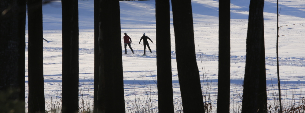 Two women ski on a trail at Harris Farm in Dayton on Thursday, January 29, 2015. More snow forecast for Friday should make winter outdoor enthusiasts happy. (Photo by Gregory Rec/Staff Photographer)