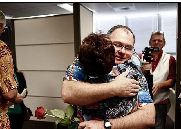 Ross Griffith, right, is congratulated by Arlene Goldberg on Tuesday after Griffith married his partner in Fort Myers, Fla. The U.S. Supreme Court could decide as early as Friday to take up the issue. The Associated Press