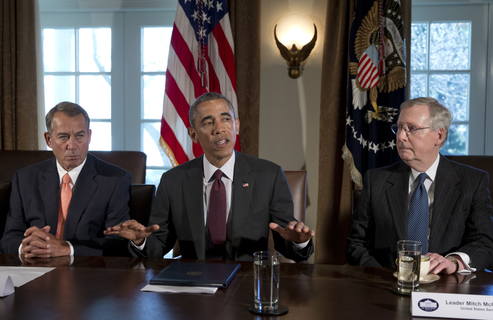 President Obama, flanked by House Speaker John Boehner of Ohio, left, and Senate Majority Leader Mitch McConnell of Ky., speaks to media on Tuesday before his meeting with the bipartisan, bicameral leadership of Congress to discuss wide-ranging issues. The Associated Press