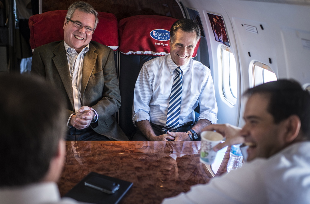 Former Florida Gov. Jeb Bush, left, Sen. Marco Rubio, bottom right, and Mitt Romney likely won’t spend much time together in 2015 as the Republican presidential primary heats up. Romney’s surprise announcement that he is seriously considering a third run for the White House has forced other would-be candidates to make moves. 2012 Washington Post file photo/Melina Mara