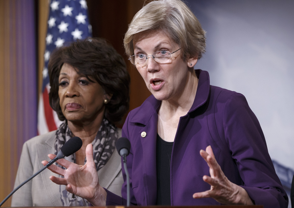 Sen. Elizabeth Warren, D-Mass., a member of the Senate Banking Committee, and Rep. Maxine Waters, D-Calif., left.