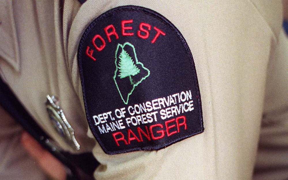 Maine’s forest rangers would focus on firefighting, monitoring the health of Maine’s forests and working with landowners on pest management under Gov. Paul LePage’s proposed budget. 1999 Press Herald File Photo/John Patriquin