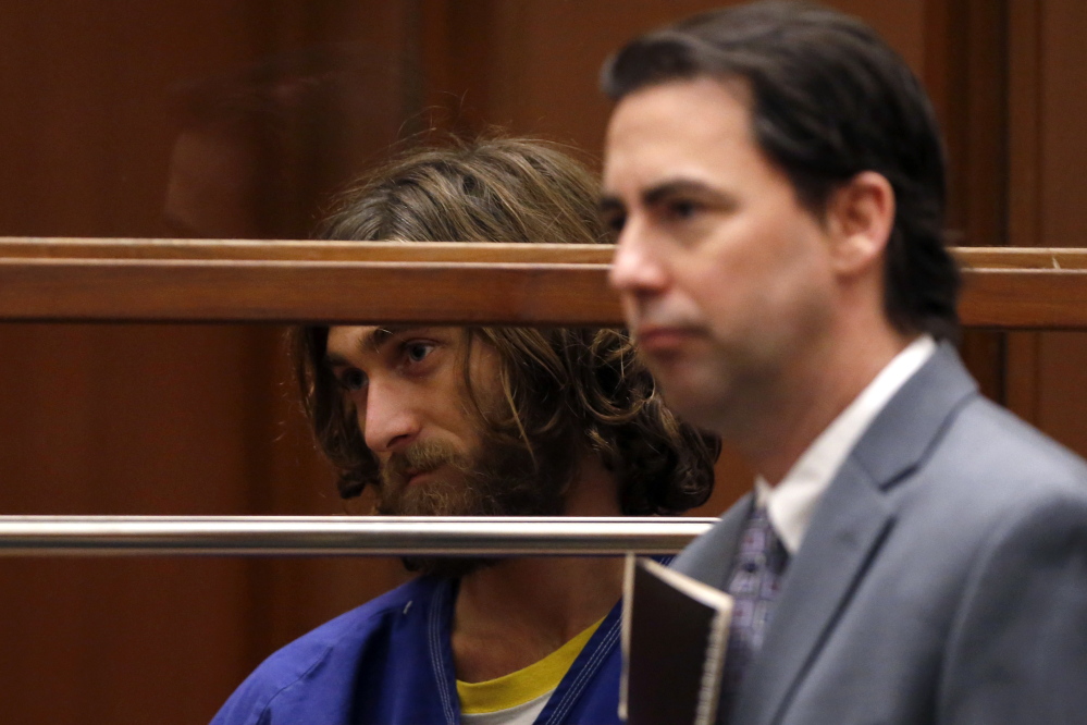 Colby Robert Kronholm, left, appears in court for his arraignment on a charge of murdering a man in Hollywood, in Los Angeles, California, on Wednesday. Reuters