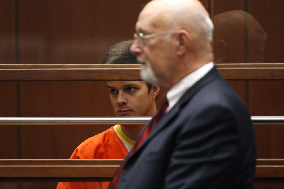 Troy McVey, left, appears in court for his arraignment on a charge of murdering a man in Hollywood, in Los Angeles, California, on Wednesday. His lawyer Arthur P. Lindars, right, said McVey’s mental well-being is “surprisingly good.” Reuters