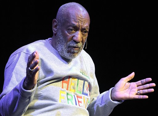 Bill Cosby performs during a Nov. 21, 2014, show in Melbourne, Fla., where he was greeted by an adoring audience that laughed so hard they slapped their knees, shouted love at the stage and rose to their feet as he came and went. Protesters didn't show and there were no hecklers. The Associated Press