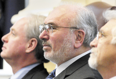 John Fitzsimmons, center, who has been president of the Maine Community College System since 1990, knows that Gov. Paul LePage is "looking to make a change" in the system's leadership, the governor said in announcing his budget Friday. 2013 Kennebec Journal file photo/Joe Phelan