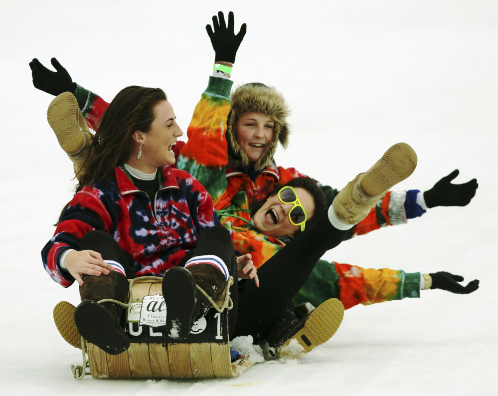 In this February 2009 file photo toboggan racing contestants enjoy their ride in the National Toboggan Championships in Camden. The U.S. National Toboggan Championships will take place next weekend at Camden Snow Bowl.