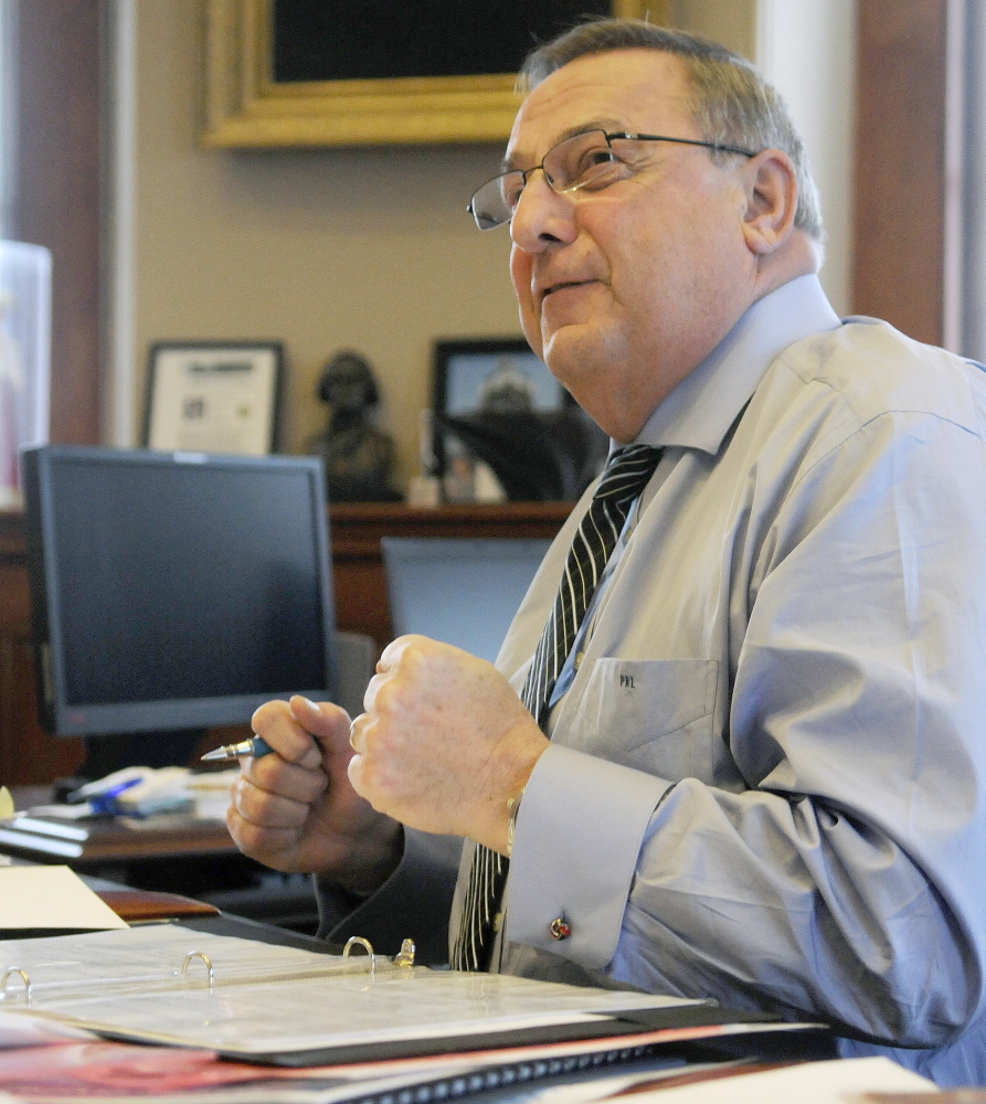 Gov. Paul LePage emphasizes a point he intends to make while drafting his State of the State address Monday in his Augusta office. LePage will give the speech before a joint session of the Legislature tonight. LePage said he plans to outline a transformation of the state tax code during the speech.