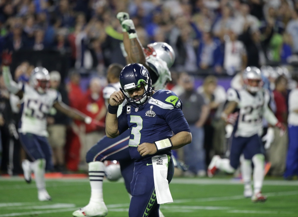 Seattle Seahawks quarterback Russell Wilson (3) reacts after throwing an interception to New England Patriots strong safety Malcolm Butler during the second half of Super Bowl XLIX on Sunday in Glendale, Ariz. The Patriots won 28-24.