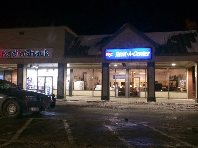 A masked gunman robbed the manager of the Rent-A-Center store in the Elm Plaza shopping area off  upper Main Street in Waterville at about 7:30 p.m. Police say the man showed a black handgun and took off with the store's bank deposit bag.