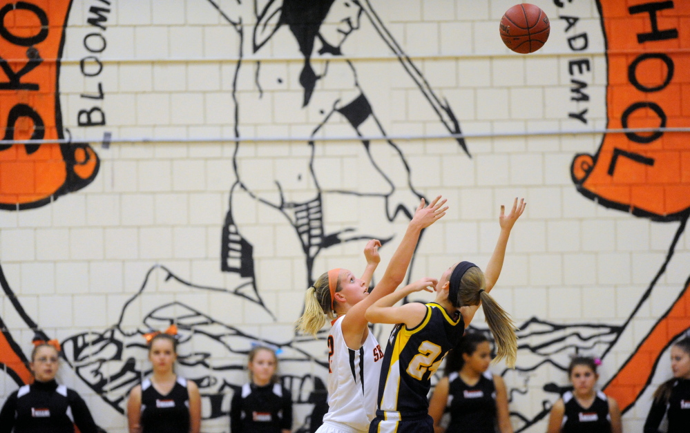 The Skowhegan Area High School Indian mascot is emblazoned on the wall of the gymnasium where a game against Mt. Blue High School in Skowhegan takes place in December 2013.