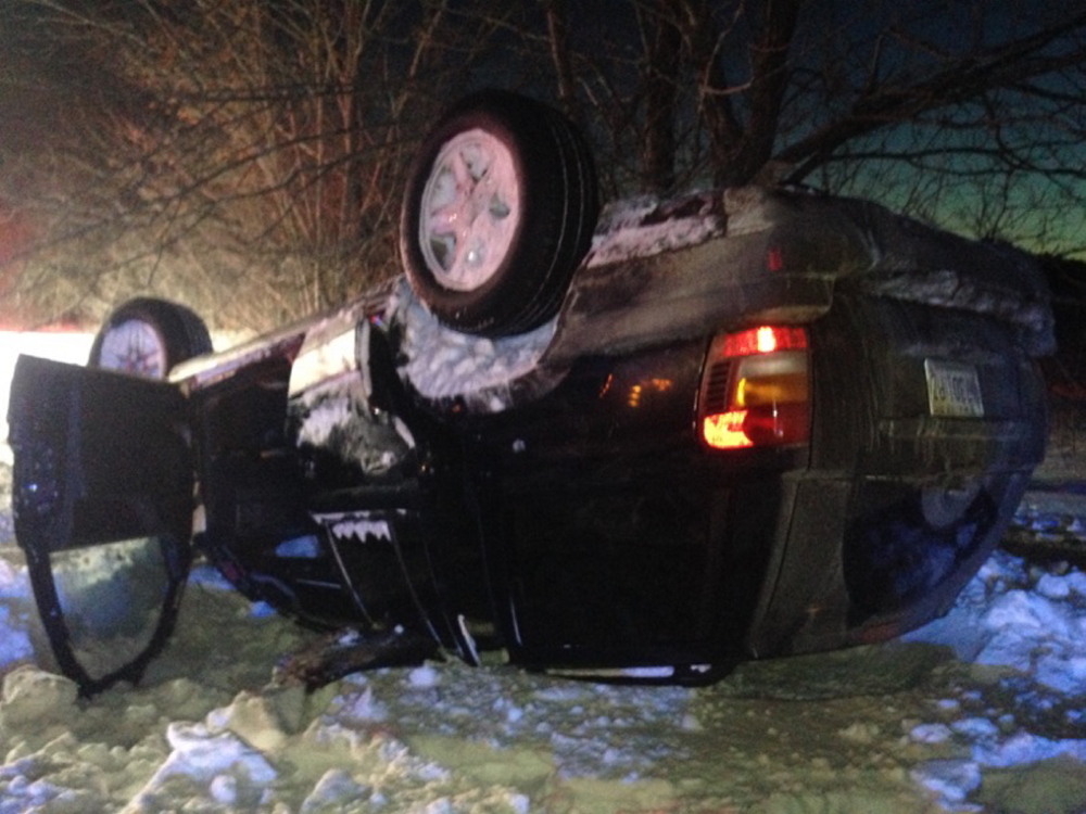 Jennifer Merry of Waterville was charged with criminal OUI and assault after her Jeep rolled over on West River Road on Monday. Merry allegedly bit the hand of a Waterville officer and a state police detective at the scene of the accident.