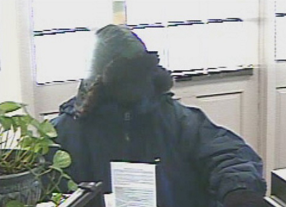 Bank robber seen in surveillance photograph at the Bangor Savings Bank in Pittsfield which was robbed on Feb. 7, 2014. He is suspected in three other bank robberies in the  area. 