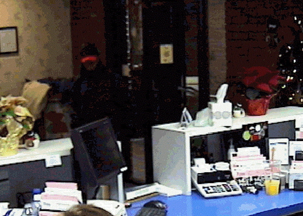 Bank robber seen in surveillance photograph at the Franklin Savings Bank in Skowhegan which was robbed on Dec. 13, 2012   He is suspected in three other bank robberies in the area.