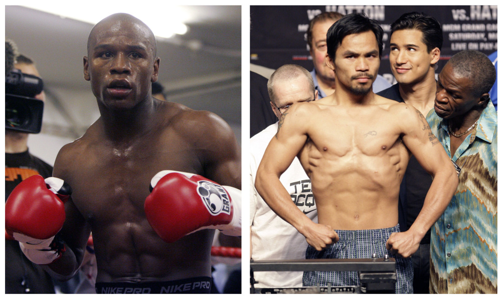 Floyd Mayweather Jr., left, will meet Manny Pacquiao on May 2 in a welterweight showdown that will be boxing’s richest fight ever. Mayweather himself announced the bout Friday after months of negotiations, posting a picture of the signed contract online.