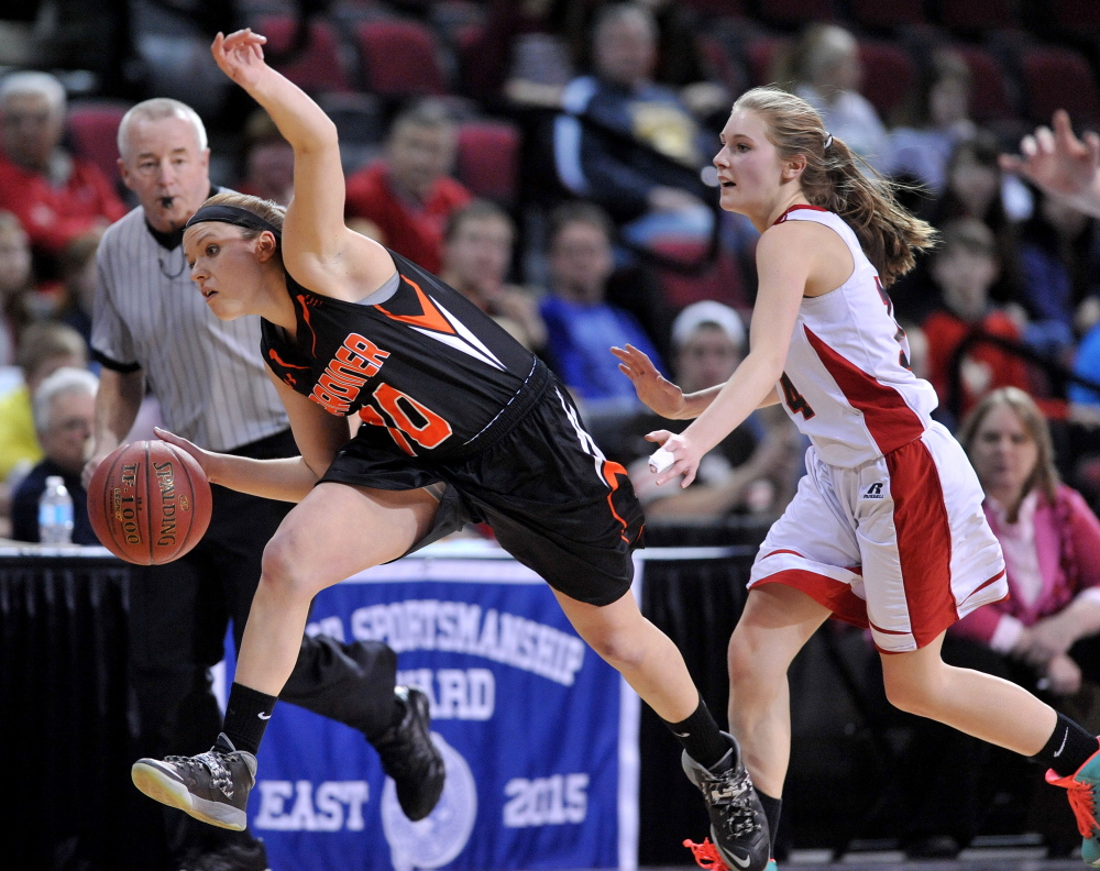 Gardiner Area High School’s Morgan Carver (10) gets fouled by Camden Hills High School’s Mara Dostie in the second half of the Eastern Class B semifinals Wednesday at the Cross Insurance Center in Bangor. Gardiner defeated Camden Hills 53-42.