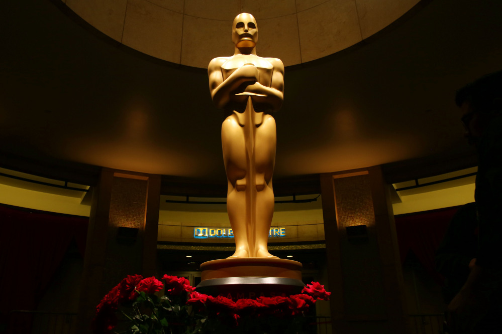 An Oscar statue is seen as preparations are made for the 87th Academy Awards in Los Angeles, Saturday.