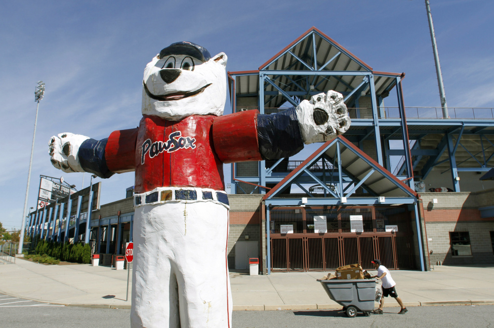 A statue of the Pawtucket Red Sox baseball team mascot “Paws” stands outside McCoy Stadium in Pawtucket, R.I. The team has been sold and is moving.