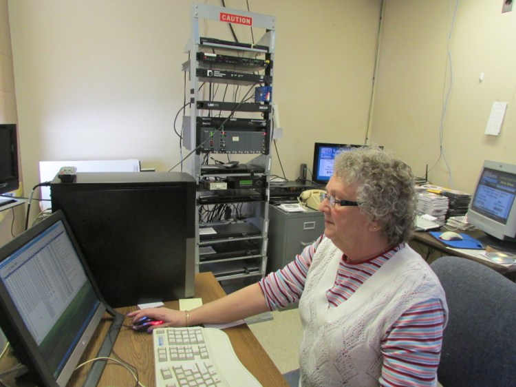 Laura Guite, station manager of CATV in Fairfield, took an unpaid leave of absence but still kept the station running when it nearly ran out of money. Its financial troubles threaten continued service to nine central Maine communities.
