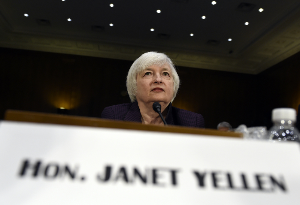 Federal Reserve Board Chair Janet Yellen prepares to testify on Capitol Hill in Washington, Tuesday before the Senate Banking Committee.