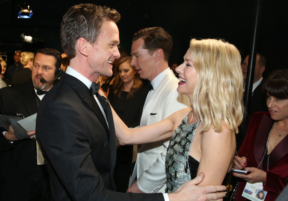 Neil Patrick Harris, left, and Naomi Watts greet backstage at the Oscars on Sunday at the Dolby Theatre in Los Angeles.