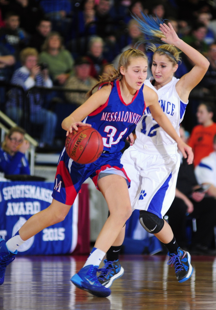 Lawrence’s Dominique Lewis defends Messalonskee’s Ally Turner during an Eastern A quarterfinal game earlier this month at the Augusta Civic Center. Lewis and the Bulldogs will take on Thornton for the Class A state championship at 3:05 p.m., Saturday at the Augusta Civic Center.