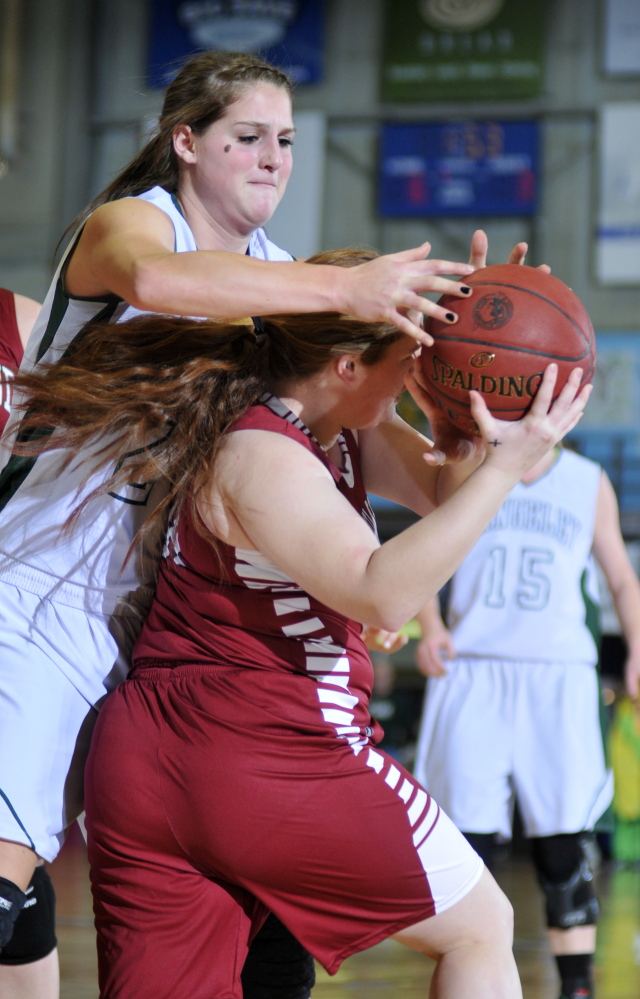 Rangeley junior forward Blayke Morin, left, tries to steal the ball from Richmond junior forward Kalah Patterson during the Western D championship game last Saturday at the Augusta Civic Center. Morin and the Lakers will play for the Class D state title Saturday against Washburn.