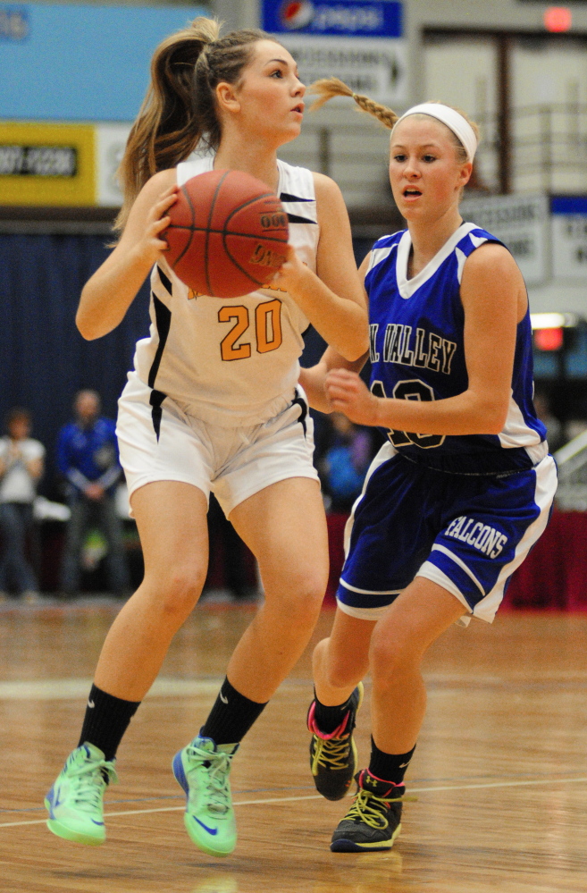 Marancook senior guard Lauren Clough, left, tries to get around Mountain Valley sophomore guard Emily Laubauaskas during a Western C semifinal Feb. 20 at the Augusta Civic Center. Maranacook will go for the Class C state title Saturday against Houlton.