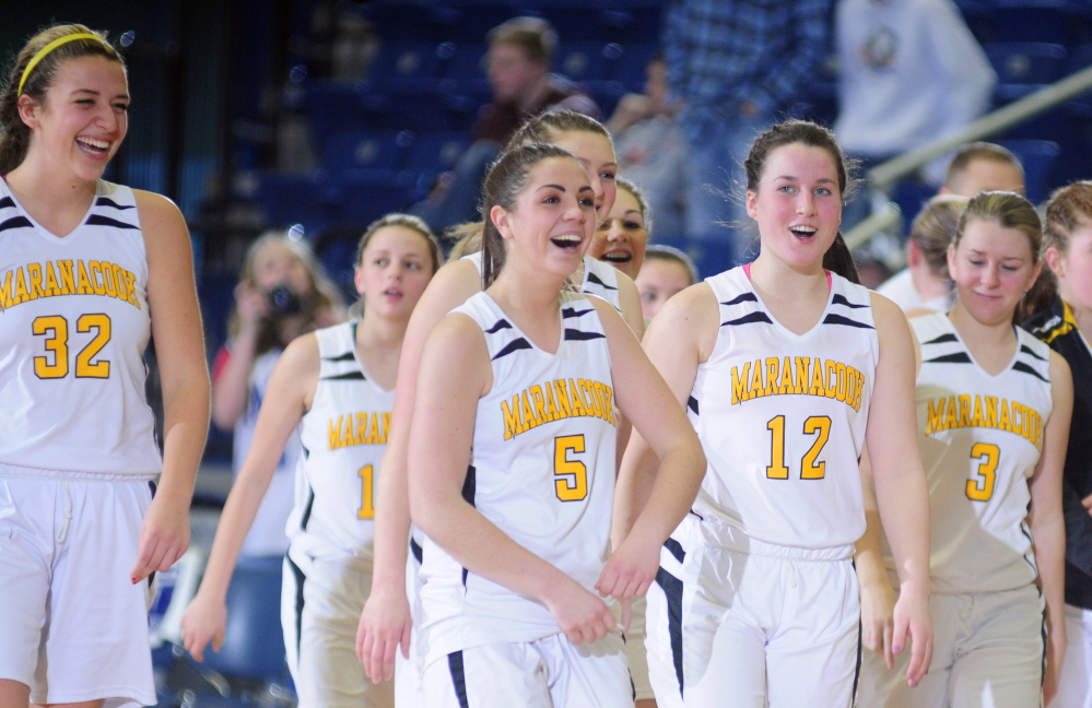 Maranacook players Christine Miller, left, Sarah Clough, Catherine Sanborn and Kristien Hall walk off the Augusta Civic Center court after they sank Mountain Valley in a Western C semifinal Feb. 20.