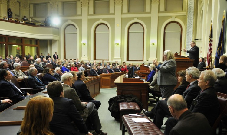 Applause erupts during Gov. LePage's State of the State speech Tuesday.