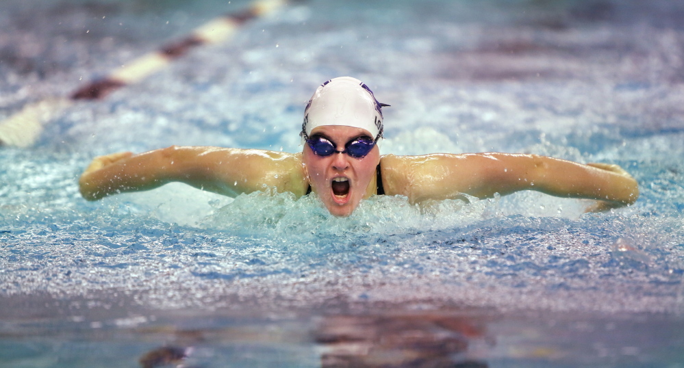 BRUNSWICK, ME - FEBRUARY 17: Kennebunk junior Marshall Lowery powers her way to victory in the 200 Yard Individual Medley race at the girls Class A swimming and diving championship at Bowdoin College in Brunswick on Tuesday, February 16, 2015. Lowery's time in the race was 2 minutes, 13.04 seconds. (Photo by Gregory Rec/Staff Photographer)
