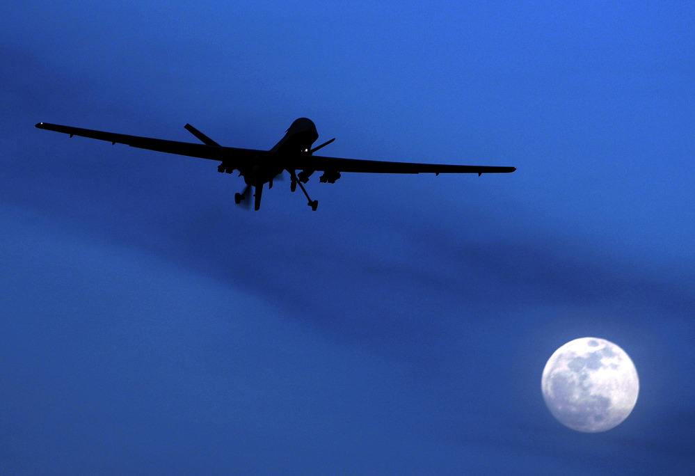 An unmanned U.S. Predator drone flies over southern Afghanistan. 
The Associated Press