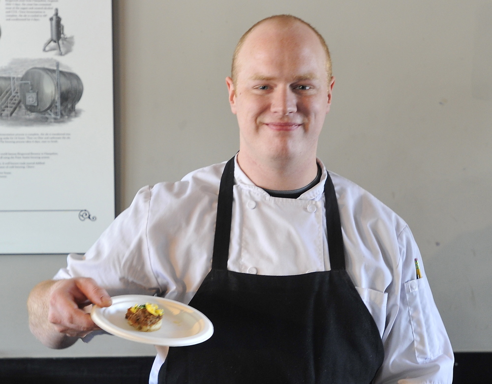SOUTH PORTLAND, ME - FEBRUARY 27: Head Chef Mitchell Ryan shows his first place entry, smoked brisket hash patties with scrambled eggs and peashoots, Italian cheese fonduta and salsa verde, at the Incredible Breakfast Cook-Off held at Sea Dog Brewing Company in South Portland. (Photo by Gordon Chibroski/Staff Photographer)