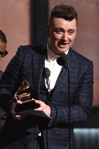 Sam Smith accepts the award for record of the year for "Stay With Me." The Associated Press