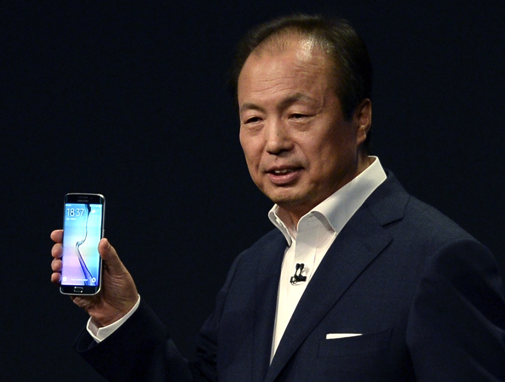 JK Shin, CEO of Samsung’s mobile division, shows the new Galaxy S6 during the Samsung Galaxy Unpacked 2015 event on the eve of this week’s Mobile World Congress wireless show, in Barcelona, Spain, Sunday.