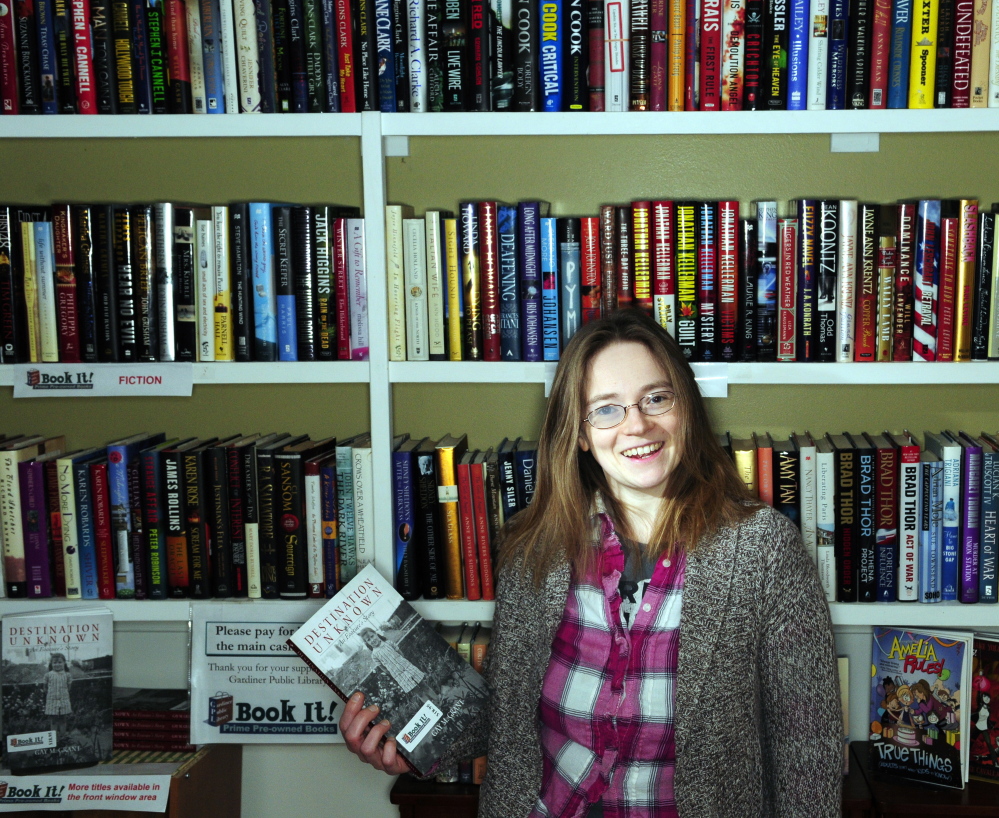 Deb Files stands in the Book It used-book shop inside Lisa’s Legit Burritos in Gardiner on Tuesday. Files is one of 99 Kennebec County residents and organizations who were awarded Spirit of America Foundation awards Tuesday night.