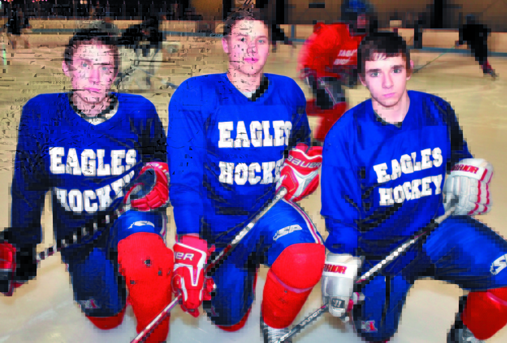 Staff photo by David Leaming 
 Former Messalonskee High School hockey players, from left, Chase Cunningham, Sam Dexter and James Varney left their marks on the program.