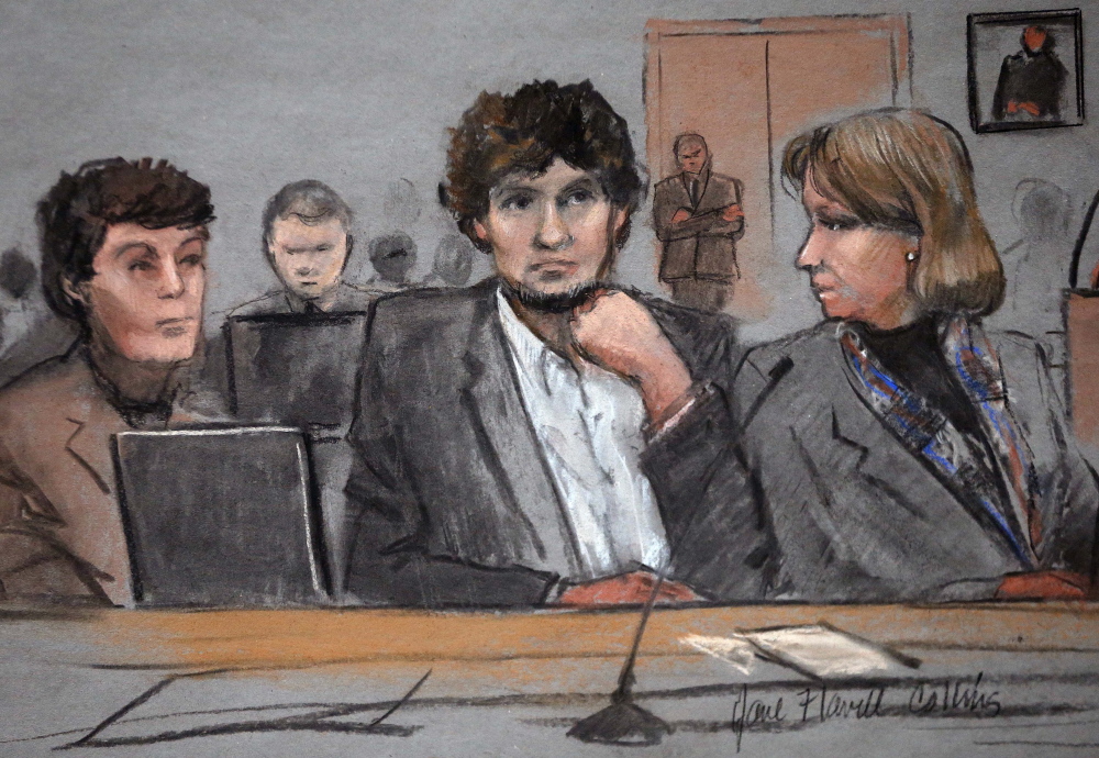 Defendant Dzhokhar Tsarnaev is depicted between defense attorneys Miriam Conrad, left, and Judy Clarke in this courtroom sketch from Thursday’s trial in Boston.