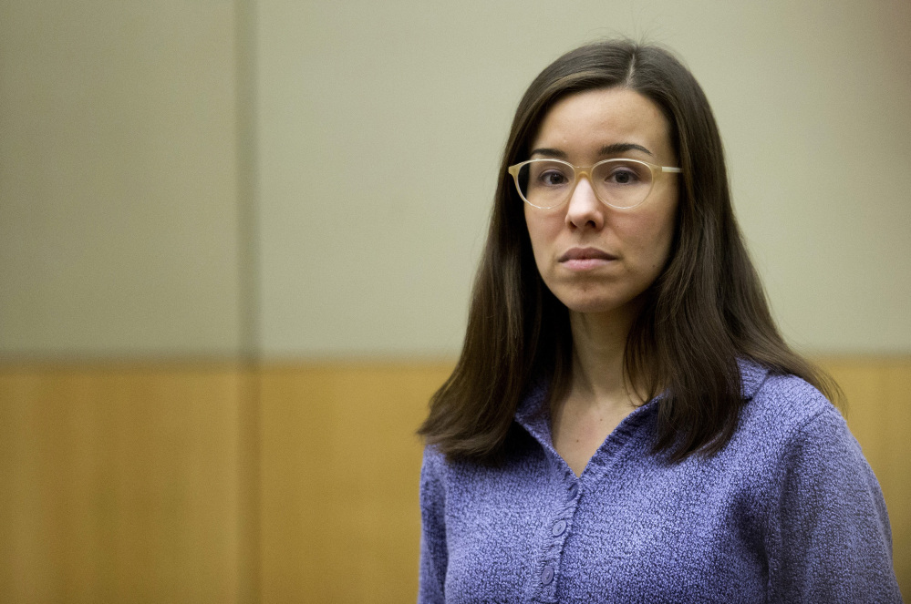 Jodi Arias stands for the jury during her sentencing retrial at Maricopa County Superior Court in Phoenix last month. Arias was spared the death penalty Thursday after jurors deadlocked on her punishment for killing her lover in 2008.