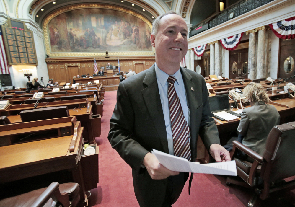 Wisconsin Assembly Speaker Robin Vos, R-Rochester, walks off the floor after passage of right-to-work legislation in the Assembly at the State Capitol in Madison, Wis., on Friday.