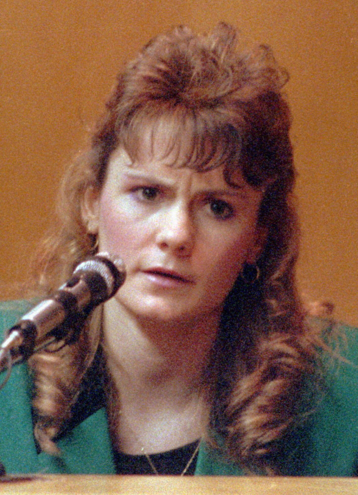 FILE - In this 1991 file photo Pamela Smart, testifies in Rockingham County Superior Court in Exeter, N.H. Smart was convicted of conspiring with her 15 year-old lover, William "Billy" Flynn, to kill her 24 year-old husband, Greggory Smart, on May 1, 1990, in Derry, N.H. Smart is serving a life without parole sentence. Flynn pleaded guilty to killing her husband and has a parole hearing scheduled for Thursday, March 12, 2015. (AP Photo/Jim Cole, File)
