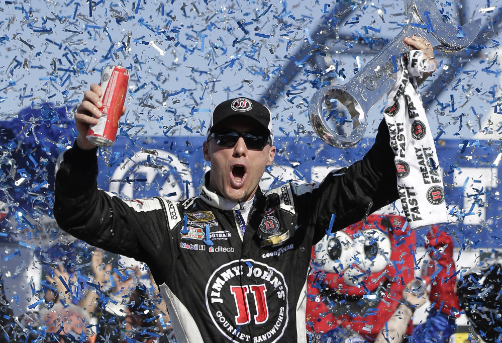 Kevin Harvick celebrates in Victory Lane after winning Sunday in Las Vegas. It’s the first win of the season for the defending Sprint Cup champion.